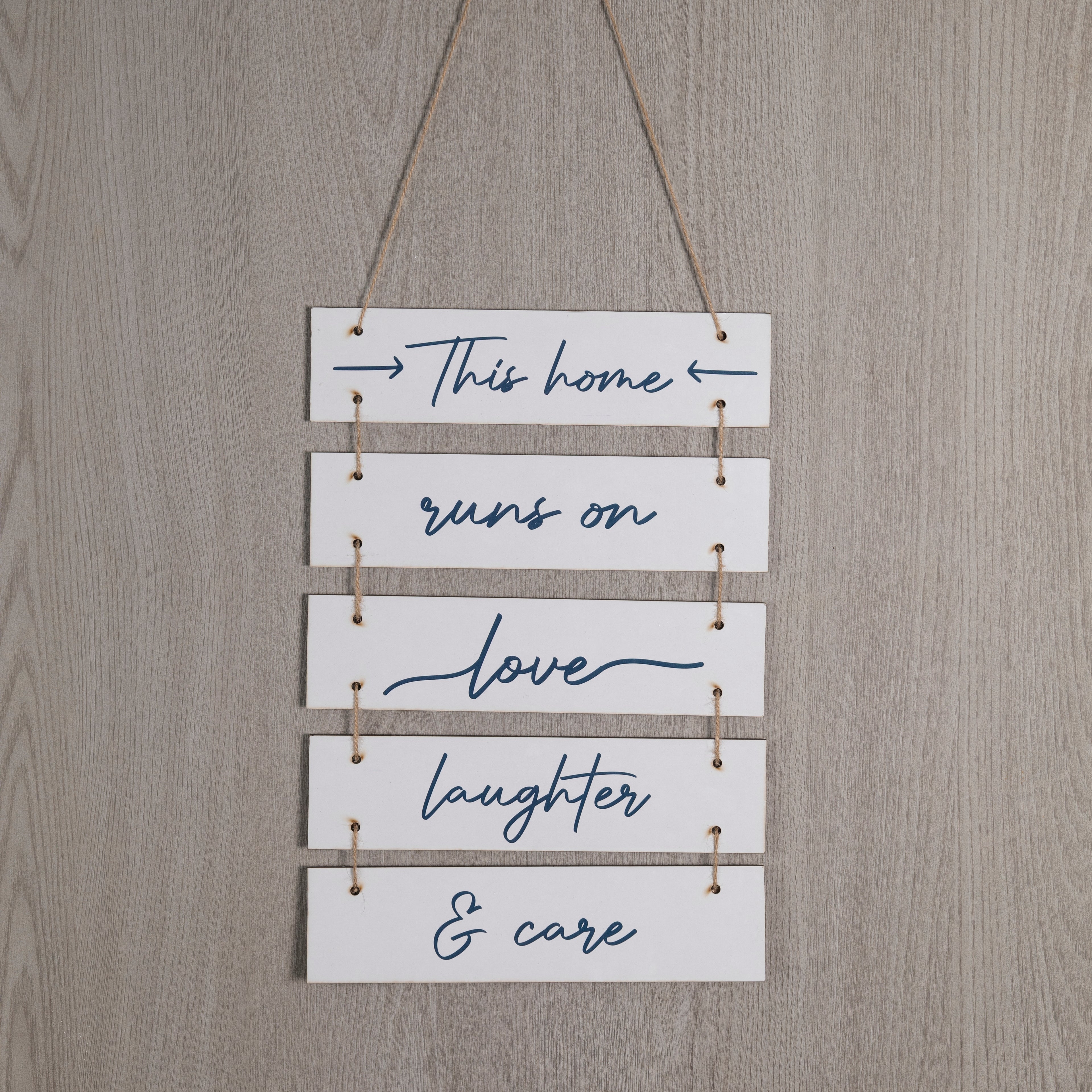 Wooden Hanging Home Sign – This home runs on love, laughter & care